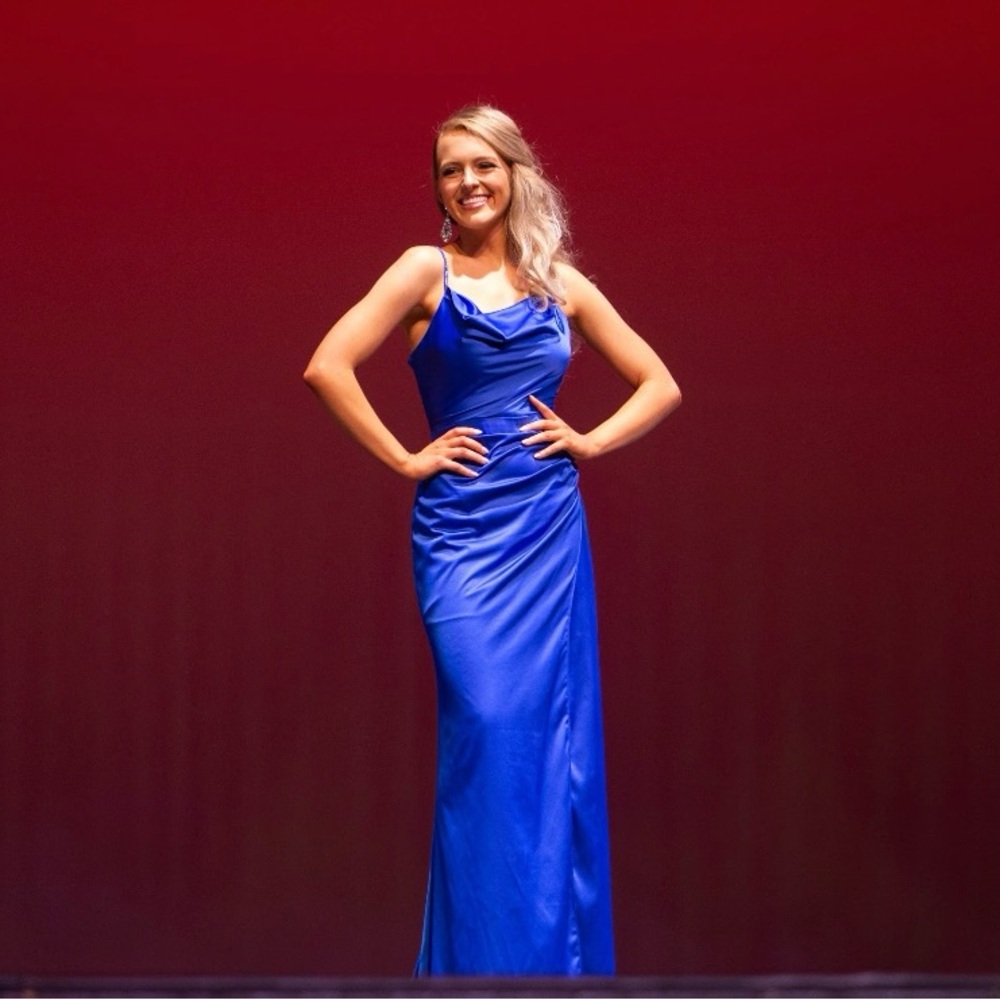 Satin Royal Blue Prom Dress. Bow tie in the back. Rhinestoned straps.